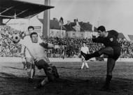 Gerd Muller goes for goal